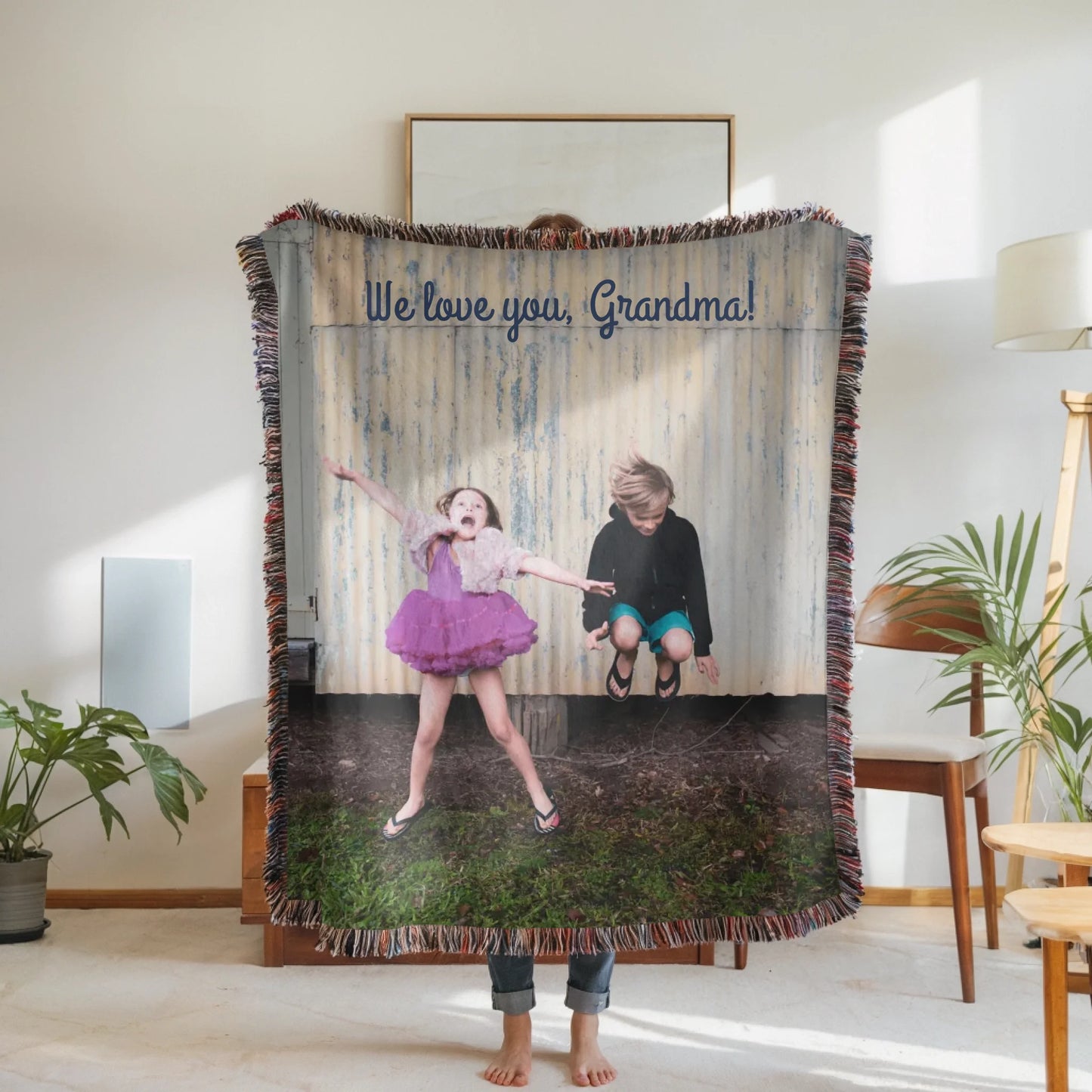 Woven Blanket Woman Holding for use as mockup within TeeinBlue-Background
