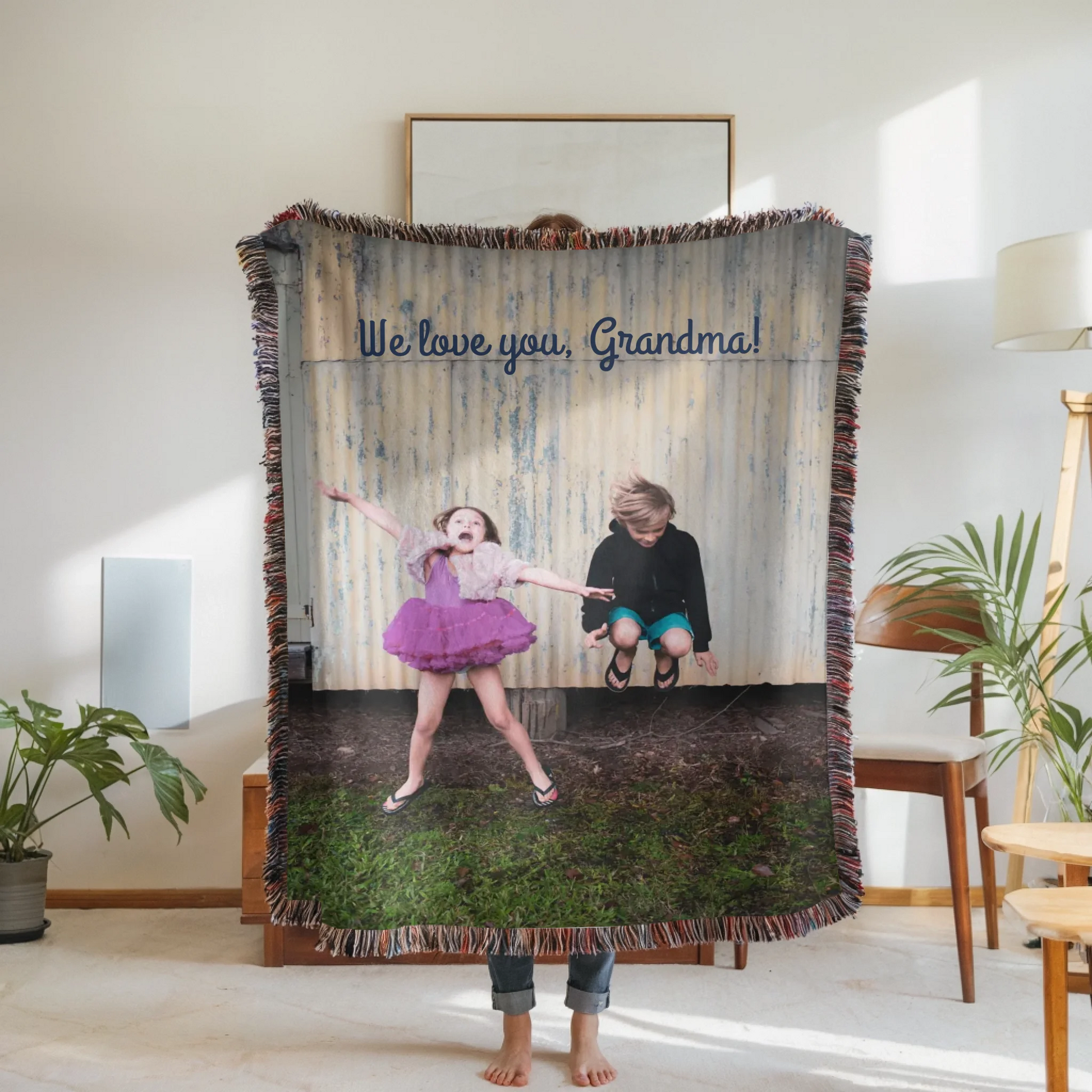 Woven Blanket Woman Holding for use as mockup within TeeinBlue-Background