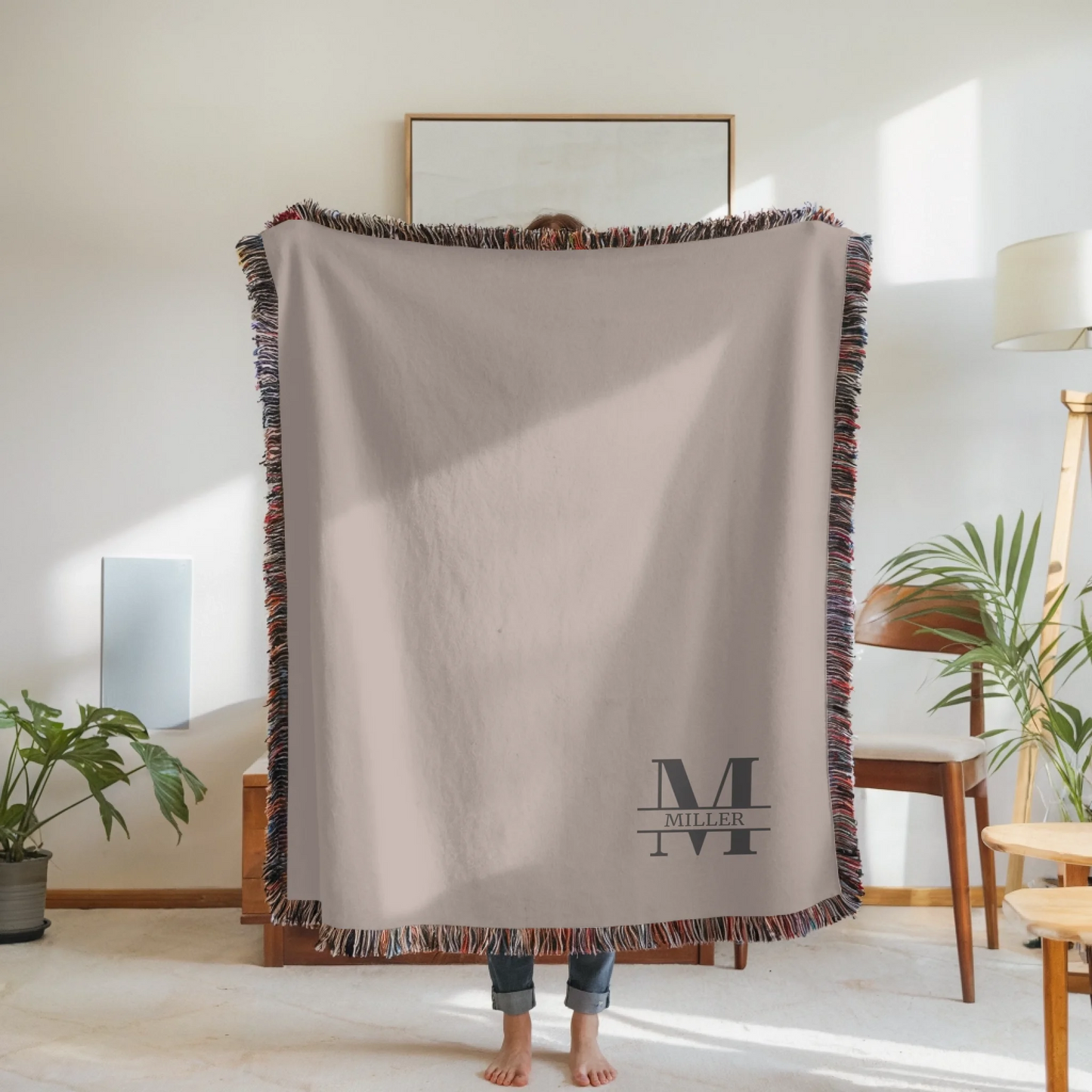 Woven Blanket Woman Holding for use as mockup within TeeinBlue-Background