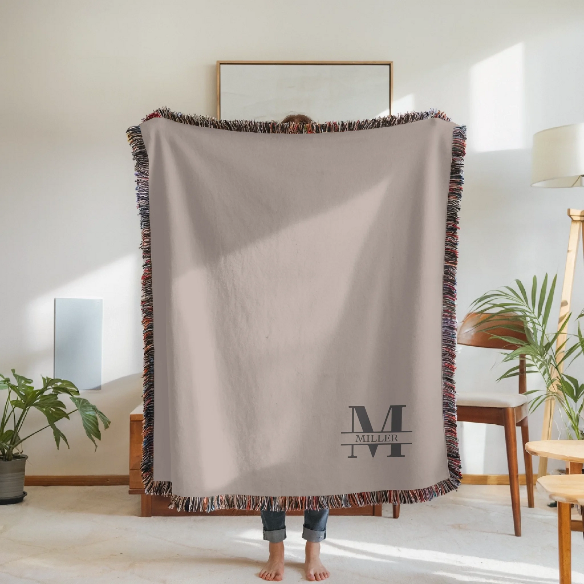 Woven Blanket Woman Holding for use as mockup within TeeinBlue-Background