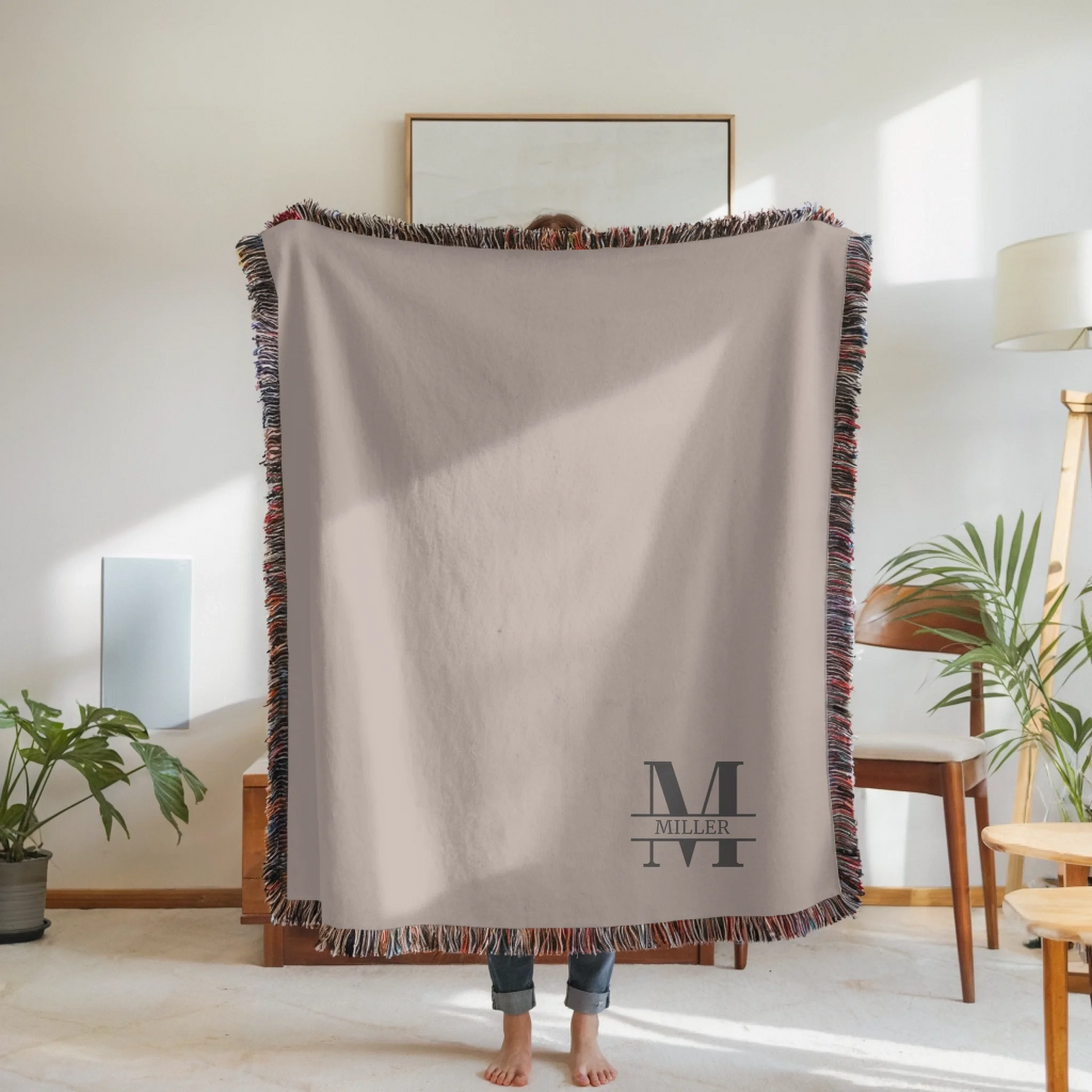 Woven Blanket Woman Holding for use as mockup within TeeinBlue-Background