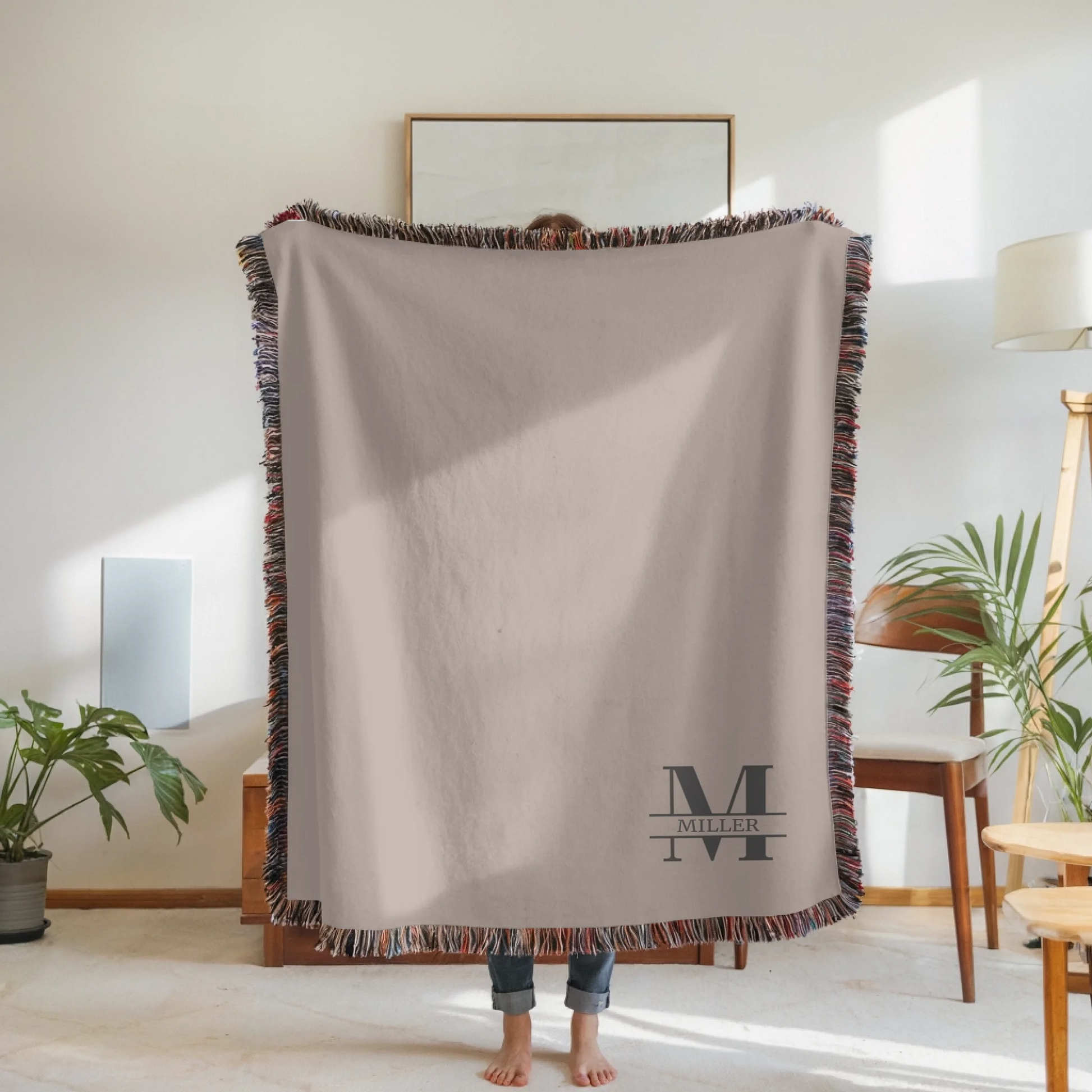 Woven Blanket Woman Holding for use as mockup within TeeinBlue-Background