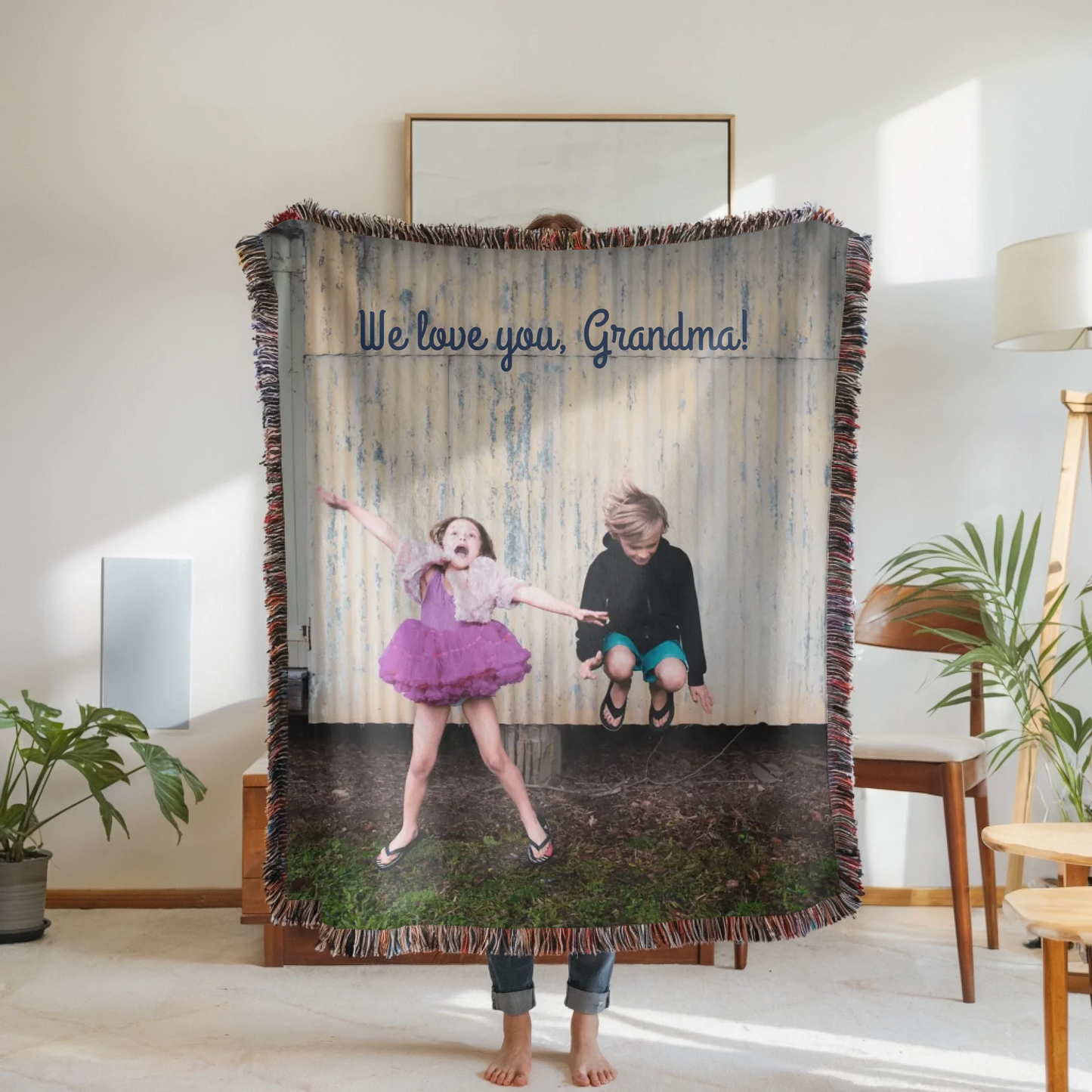 Woven Blanket Woman Holding for use as mockup within TeeinBlue-Background