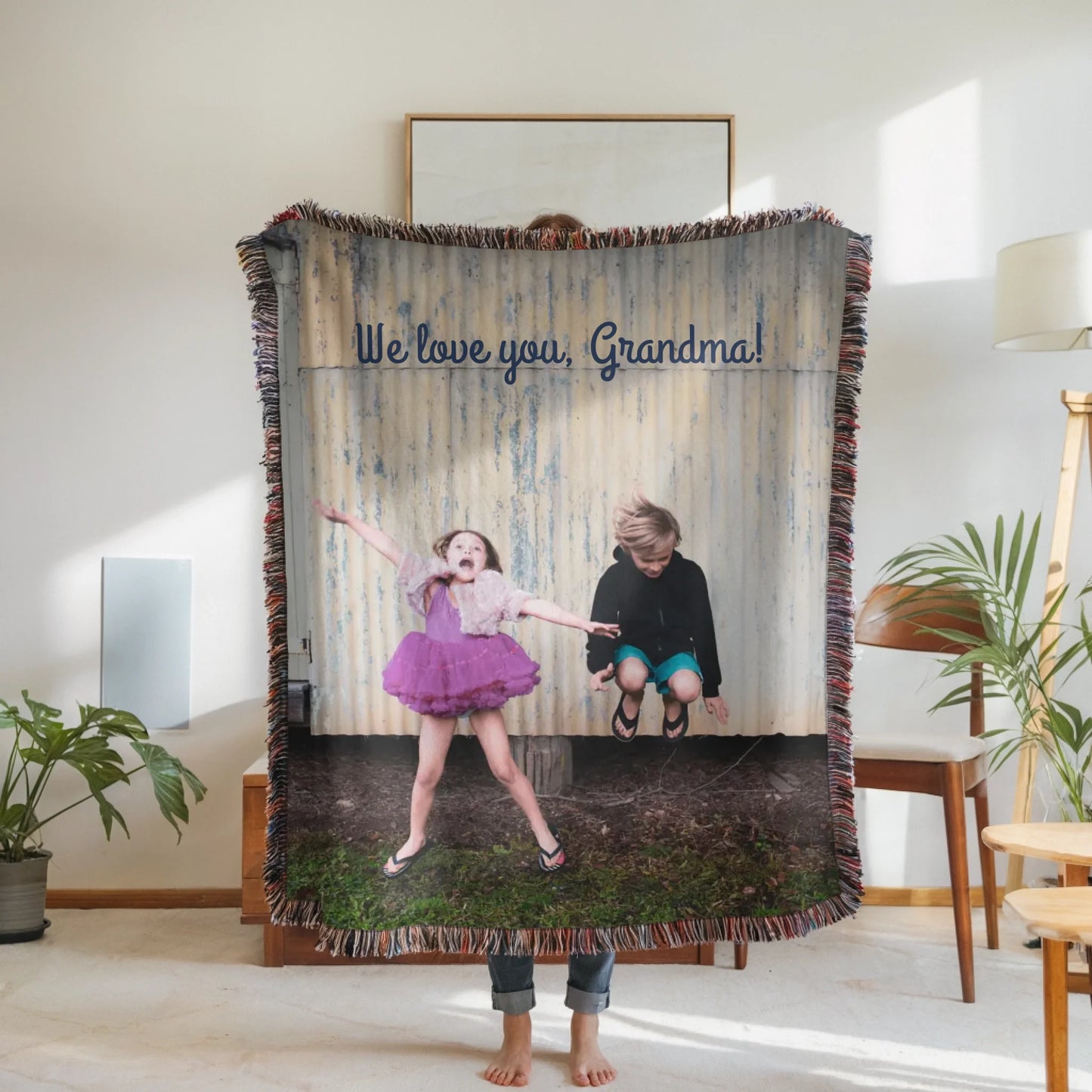 Woven Blanket Woman Holding for use as mockup within TeeinBlue-Background