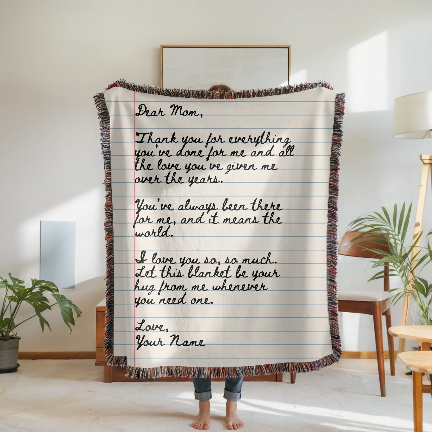 Woven Blanket Woman Holding for use as mockup within TeeinBlue-Background