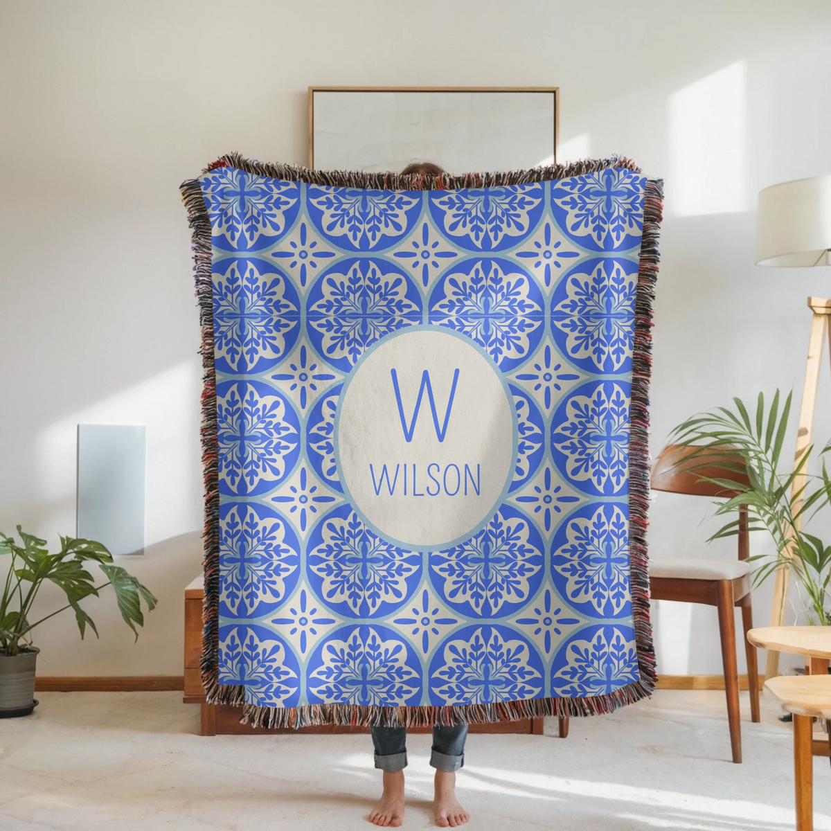 Woven Blanket Woman Holding for use as mockup within TeeinBlue-Background